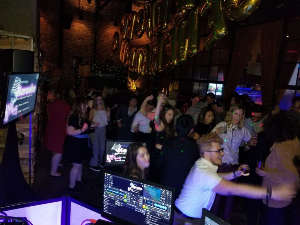 Showtime TV The L Word with Mr Dj Services and crowded indoor party, guests dancing and singing enjoying the Karaoke Party Dj Services